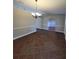 Bright dining room with tile floors and a chandelier at 2537 Tishman Ave, North Port, FL 34286