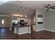 Modern kitchen with island and stainless steel appliances at 2537 Tishman Ave, North Port, FL 34286