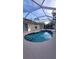 Inviting kidney-shaped pool with screened enclosure at 2537 Tishman Ave, North Port, FL 34286