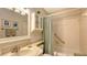 Bathroom with tub, shower, and updated vanity at 2621 Golf Course Dr # 401, Sarasota, FL 34234