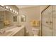 Bathroom with shower, vanity, and updated fixtures at 2621 Golf Course Dr # 401, Sarasota, FL 34234