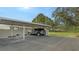 Covered carport parking with space for one vehicle at 2621 Golf Course Dr # 401, Sarasota, FL 34234