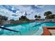 Inviting community swimming pool with ample deck space at 2621 Golf Course Dr # 401, Sarasota, FL 34234