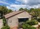 Well-maintained stucco home with brown roof at 2764 Hidden Lake Blvd # 2764, Sarasota, FL 34237