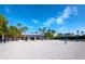 Beach volleyball court with covered seating area at 3060 Grand Bay Blvd # 113, Longboat Key, FL 34228