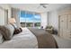 King size bed in spacious bedroom with ocean view at 3060 Grand Bay Blvd # 113, Longboat Key, FL 34228