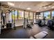 Well-equipped fitness center with modern machines and ocean views at 3060 Grand Bay Blvd # 113, Longboat Key, FL 34228