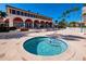 Relax in this community hot tub, steps from the clubhouse at 3060 Grand Bay Blvd # 113, Longboat Key, FL 34228