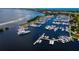 Aerial view of a full-service marina with many boats at 3060 Grand Bay Blvd # 113, Longboat Key, FL 34228