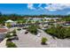 Aerial view of shopping center with parking at 3060 Grand Bay Blvd # 113, Longboat Key, FL 34228