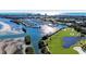 Aerial view of marina, golf course, and ocean at 3080 Grand Bay Blvd # 544, Longboat Key, FL 34228