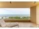 Relaxing balcony with water views at 3080 Grand Bay Blvd # 544, Longboat Key, FL 34228