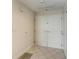 Simple condo entryway featuring double doors and neutral wall tones at 3080 Grand Bay Blvd # 544, Longboat Key, FL 34228