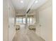 Hallway with mirrored closet doors and ocean view at 3080 Grand Bay Blvd # 544, Longboat Key, FL 34228