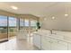 Bright kitchen with white cabinets and ocean views at 3080 Grand Bay Blvd # 544, Longboat Key, FL 34228