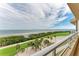 Stunning view from balcony overlooking water and golf course at 3080 Grand Bay Blvd # 544, Longboat Key, FL 34228