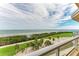 Stunning panoramic view of the water, golf course, and lush landscape at 3080 Grand Bay Blvd # 544, Longboat Key, FL 34228