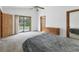 Spacious bedroom with carpet, sliding glass doors and a dresser at 3231 Yorktown St, Sarasota, FL 34231