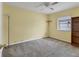 Spacious bedroom with neutral carpeting and built-in shelving at 3231 Yorktown St, Sarasota, FL 34231