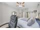 Bedroom with king-size bed and adjacent bathroom at 3506 Culpepper Ter, North Port, FL 34286