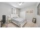 Cozy bedroom with a queen bed, gray bedding, and double door closet at 3506 Culpepper Ter, North Port, FL 34286