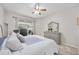 Main bedroom with king-size bed and backyard access at 3506 Culpepper Ter, North Port, FL 34286