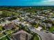 Aerial view of a residential area with houses, roads, and landscaping at 363 64Th Avenue E Cir, Bradenton, FL 34203