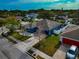 Aerial view of a charming house with a spacious backyard and a well-manicured lawn at 363 64Th Avenue E Cir, Bradenton, FL 34203