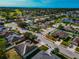 Aerial view of a residential neighborhood with houses and roads at 363 64Th Avenue E Cir, Bradenton, FL 34203