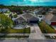 Attractive single-Gathering home with a two-car garage, driveway, and neatly landscaped yard at 363 64Th Avenue E Cir, Bradenton, FL 34203