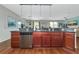 Updated kitchen featuring stainless steel appliances and dark wood cabinetry at 363 64Th Avenue E Cir, Bradenton, FL 34203