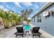 Relaxing poolside patio with lounge chairs and tropical landscaping at 363 64Th Avenue E Cir, Bradenton, FL 34203