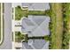 Bird's eye view of a villa, driveway, and surrounding landscape at 3922 Wildgrass Pl, Parrish, FL 34219