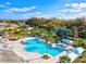 Expansive pool area with multiple pools and plenty of seating at 3922 Wildgrass Pl, Parrish, FL 34219