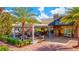 Outdoor seating area at The Grove Restaurant, featuring a patio and modern design at 3922 Wildgrass Pl, Parrish, FL 34219