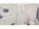 Modern bathroom with a large glass shower and white tile at 3987 Maceachen Blvd # 123, Sarasota, FL 34233