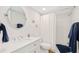 Clean bathroom with white tile and a modern vanity at 3987 Maceachen Blvd # 123, Sarasota, FL 34233