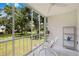 Peaceful enclosed patio with leafy green views at 3987 Maceachen Blvd # 123, Sarasota, FL 34233