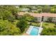 Community pool and sundeck area, aerial view at 3987 Maceachen Blvd # 123, Sarasota, FL 34233