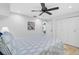 Serene bedroom with a full-size bed and closet at 4027 Siren Rd, Venice, FL 34293