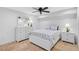 Cozy bedroom with a full-size bed and white dresser at 4027 Siren Rd, Venice, FL 34293