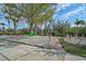 Relaxing hammock and pathway in a tropical setting at 4027 Siren Rd, Venice, FL 34293