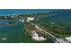 Aerial view of waterfront community, showcasing lush landscaping and waterways at 418 Sarabay Rd, Osprey, FL 34229