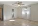 Bright bedroom with ceiling fan and tile floors at 418 Sarabay Rd, Osprey, FL 34229