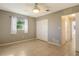 Spacious bedroom with tile floors and ceiling fan at 418 Sarabay Rd, Osprey, FL 34229