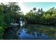 Navigable canals offer scenic waterways for kayaks and small boats at 418 Sarabay Rd, Osprey, FL 34229