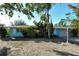 Light blue house with gray garage door at 418 Sarabay Rd, Osprey, FL 34229