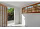 Bright laundry room with exterior access and wood door at 418 Sarabay Rd, Osprey, FL 34229