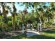 Access your boat easily from your private dock, nestled among tropical foliage at 418 Sarabay Rd, Osprey, FL 34229