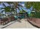 Inviting waterfront restaurant with outdoor seating, creating a relaxing atmosphere at 418 Sarabay Rd, Osprey, FL 34229